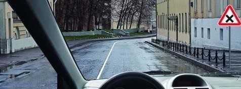 Is unloading the vehicle allowed in the effect zone of this road sign