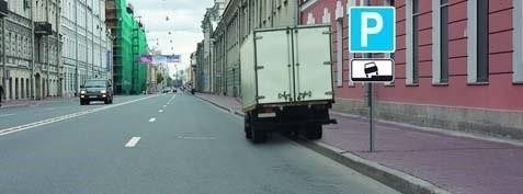 In which direction can you continue driving at the indicated intersection if you are driving a truck with a permitted maximum mass of 3 tons