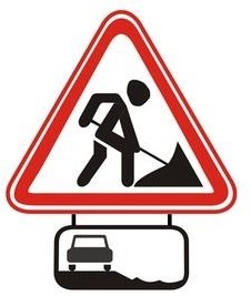What do this sign and the plate warn about?