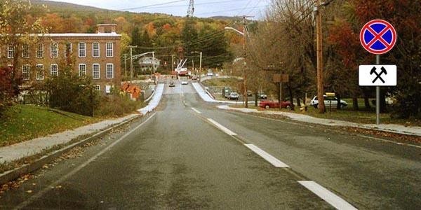 How should the driver behave when the following road sign is placed before the intersection?