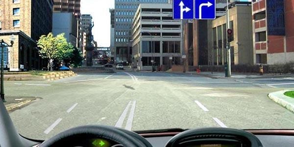 Which road sign requires the driver to proceed only to the left or right?