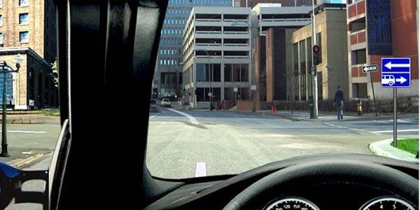 How should the driver act if they intend to make a right turn at the intersection?