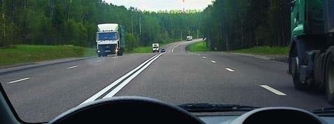 Is it allowed to continue driving in this lane after overtaking a truck?