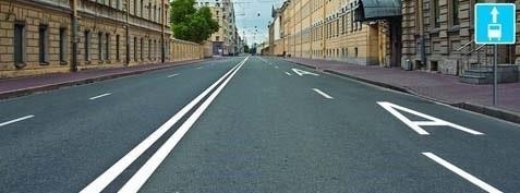 Which vehicles are allowed to drive in the right edge lane of this road?