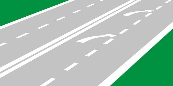 What do the arrows marked on the roadway warn about?