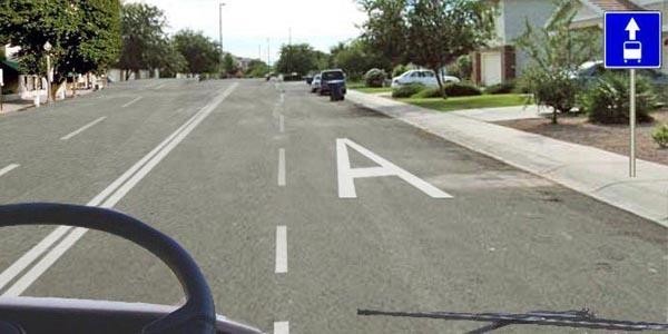 Is it allowed for a tourist bus to travel in the lane marked with "A"?